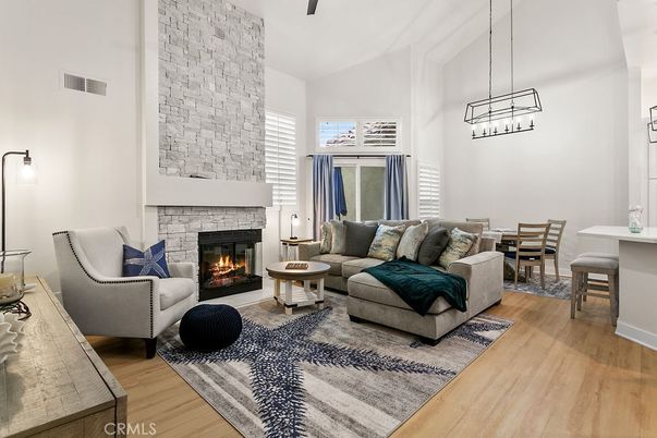 Dining room, Fireplace, Interior, Living room, Pendant Lights, Stone Walls, Wood Texture Flooring