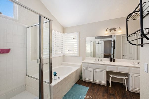 Bathroom, Dual Sink Vanities, Glass Shower, Interior, Wood Texture Flooring