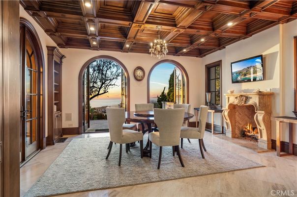 Chandelier, Dining room, Fireplace, Interior, Recessed Lighting, Water, Wooden Beams, Wooden Ceilings
