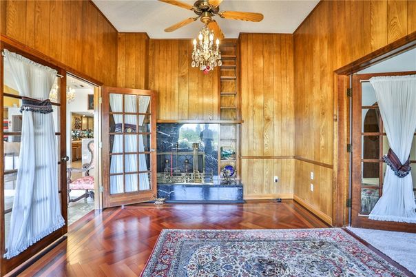Chandelier, Empty room, Fireplace, Interior, Wood Texture Flooring, Wooden Walls