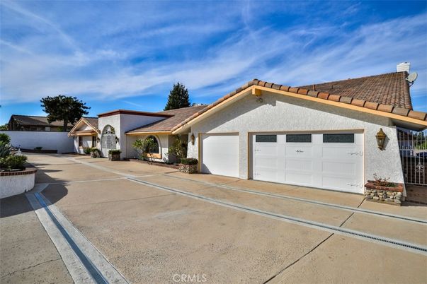 Attached, Exterior, Facade, Spanish Mediterranean