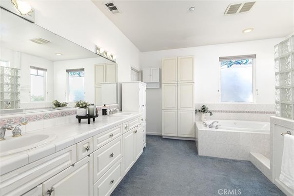 Bathroom, Dual Sink Vanities, Interior, Recessed Lighting, Tile Countertops