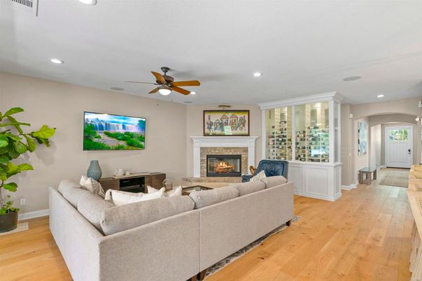 Fireplace, Interior, Living room, Recessed Lighting, Wood Texture Flooring