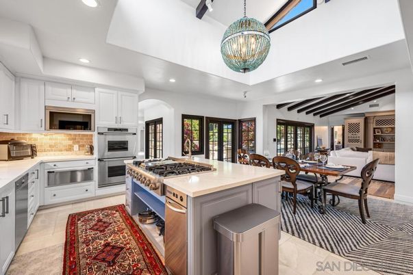 Chandelier, Dining room, Interior, Kitchen, Living room, Pendant Lights, Recessed Lighting, Stainless Steel Appliances