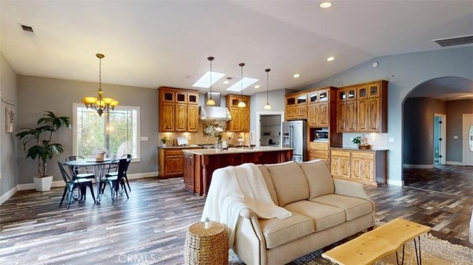 Chandelier, Dining room, Interior, Kitchen, Pendant Lights, Recessed Lighting, Stainless Steel Appliances, Wood Texture Flooring