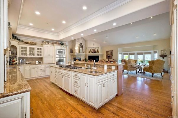 Fireplace, Interior, Kitchen, Living room, Recessed Lighting, Stainless Steel Appliances, Wood Texture Flooring