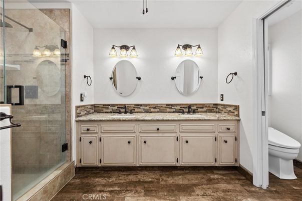 Bathroom, Dual Sink Vanities, Glass Shower, Interior, Wood Texture Flooring