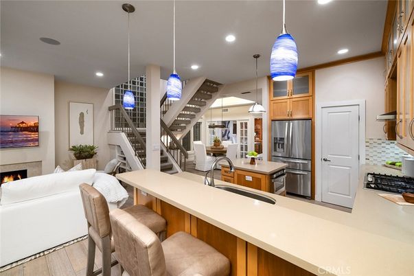 Fireplace, Interior, Kitchen, Pendant Lights, Recessed Lighting, Stainless Steel Appliances, Wood Texture Flooring