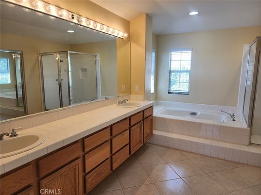 Bathroom, Dual Sink Vanities, Glass Shower, Interior, Recessed Lighting, Tile Countertops