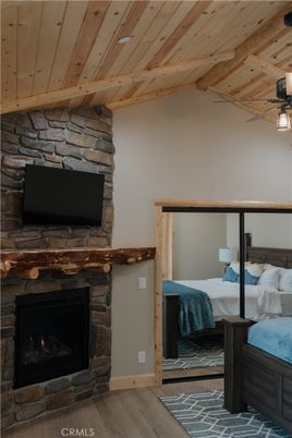 Bedroom, Fireplace, Interior, Stone Walls, Wooden Ceilings, Wood Texture Flooring