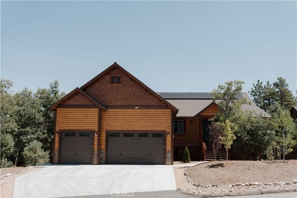 Attached, Exterior, Facade, Solar Panels, Log Home