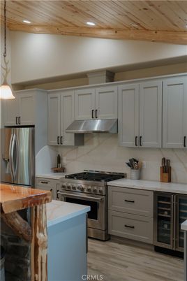 Interior, Kitchen, Pendant Lights, Recessed Lighting, Stainless Steel Appliances, Wooden Ceilings, Wood Texture Flooring