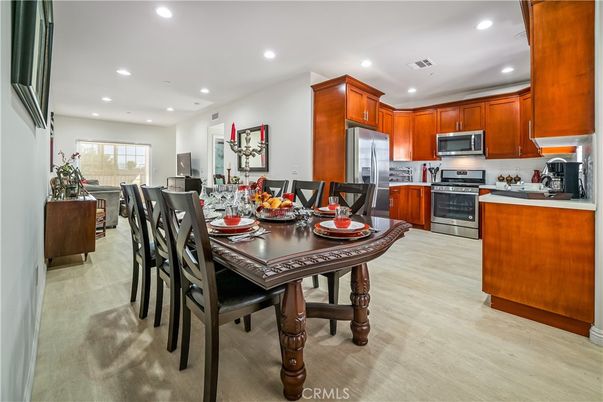 Dining room, Interior, Kitchen, Recessed Lighting, Stainless Steel Appliances, Wood Texture Flooring
