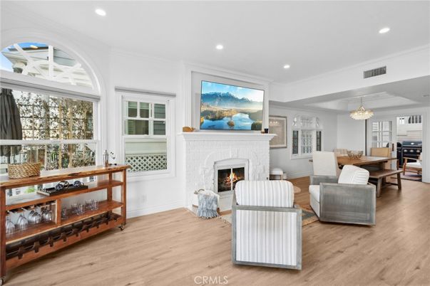 Chandelier, Dining room, Fireplace, Interior, Living room, Recessed Lighting, Wood Texture Flooring