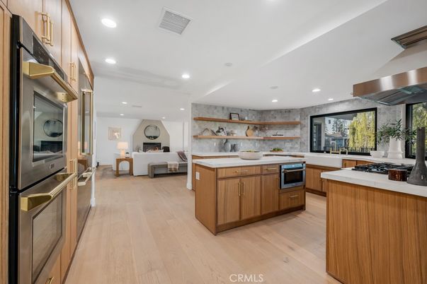 Fireplace, Interior, Kitchen, Living room, Recessed Lighting, Stainless Steel Appliances, Wood Texture Flooring