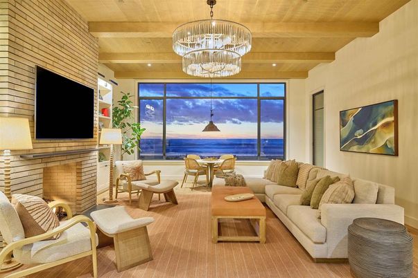 Chandelier, Dining room, Fireplace, Interior, Living room, Recessed Lighting, Water, Wooden Beams, Wooden Ceilings, Wood Texture Flooring