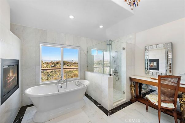 Bathroom, Fireplace, Free Standing Baths, Glass Shower, Interior, Marble Walls, Recessed Lighting