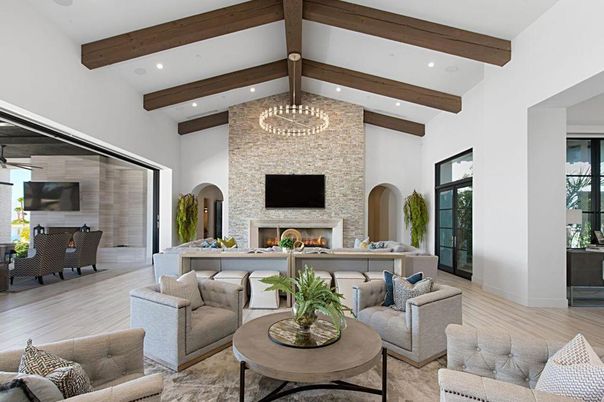 Chandelier, Dining room, Fireplace, Interior, Living room, Recessed Lighting, Stone Walls, Wooden Beams, Wood Texture Flooring