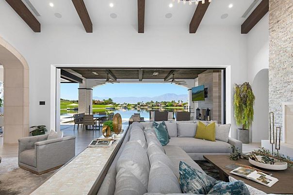 Fireplace, Interior, Living room, Recessed Lighting, Stone Walls, Water, Wooden Beams