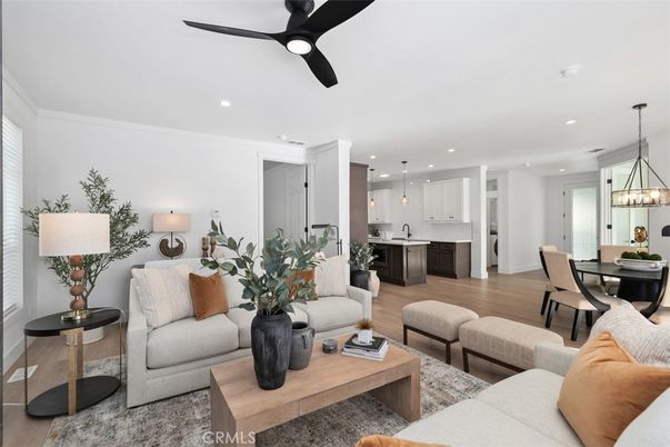 Chandelier, Dining room, Interior, Kitchen, Living room, Pendant Lights, Recessed Lighting, Stainless Steel Appliances, Wood Texture Flooring