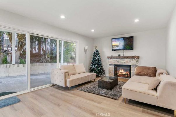 Fireplace, Interior, Living room, Recessed Lighting, Wood Texture Flooring