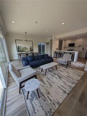 Dining room, Interior, Kitchen, Living room, Recessed Lighting, Stainless Steel Appliances, Wood Texture Flooring