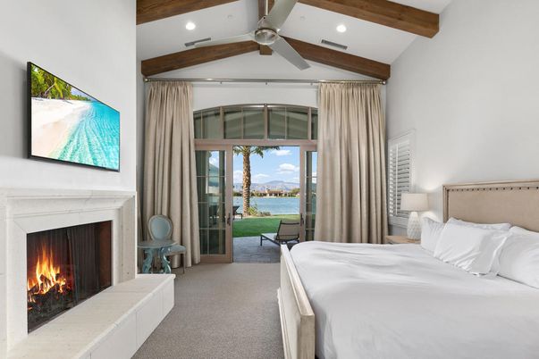Bedroom, Fireplace, Interior, Recessed Lighting, Water, Wooden Beams
