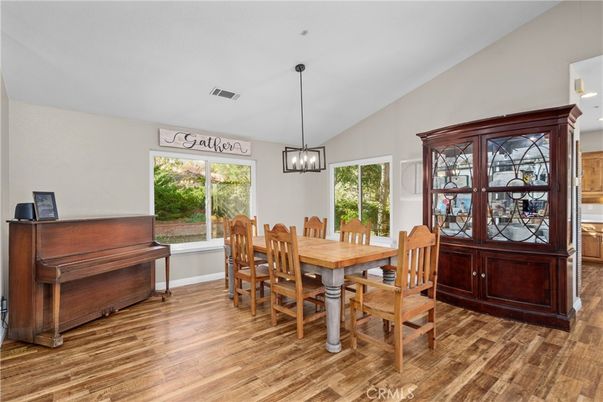 Dining room, Interior, Pendant Lights, Piano, Wood Texture Flooring