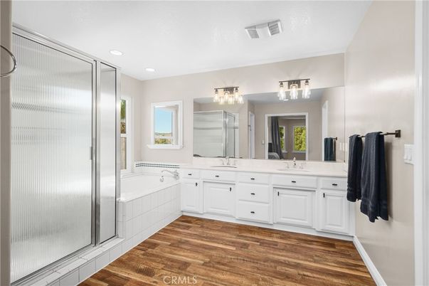 Bathroom, Dual Sink Vanities, Interior, Recessed Lighting, Wood Texture Flooring