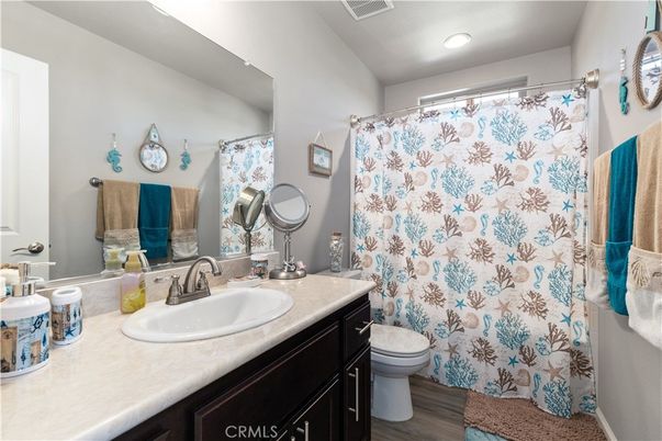 Bathroom, Dual Sink Vanities, Interior, Recessed Lighting, Wood Texture Flooring