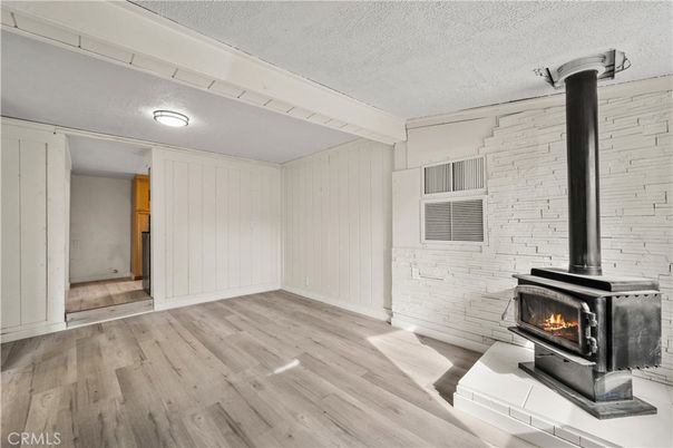 Empty room, Fireplace, Interior, Stone Walls, Wood Texture Flooring