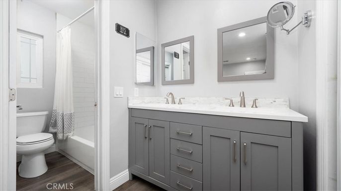 Bathroom, Dual Sink Vanities, Interior, Recessed Lighting, Wood Texture Flooring