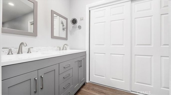 Bathroom, Dual Sink Vanities, Interior, Recessed Lighting, Wood Texture Flooring