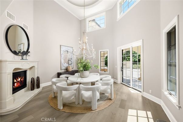 Chandelier, Dining room, Fireplace, Interior, Wood Texture Flooring