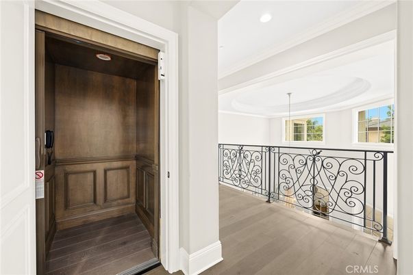 Elevator, Interior, Recessed Lighting, Wood Texture Flooring, Wooden Walls