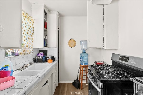 Interior, Kitchen, Tile Countertops, Wood Texture Flooring