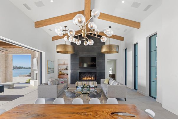 Fireplace, Interior, Living room, Pendant Lights, Recessed Lighting, Water, Wooden Beams