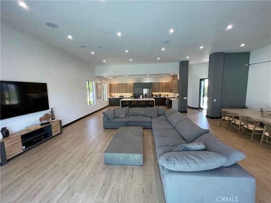 Dining room, Interior, Kitchen, Living room, Recessed Lighting, Stainless Steel Appliances, Wood Texture Flooring