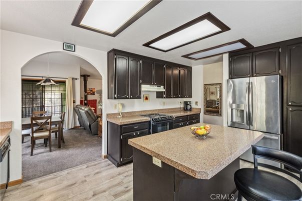 Dining room, Interior, Kitchen, Pendant Lights, Stainless Steel Appliances, Wood Texture Flooring