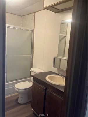 Bathroom, Glass Shower, Interior, Marble Walls, Wood Texture Flooring