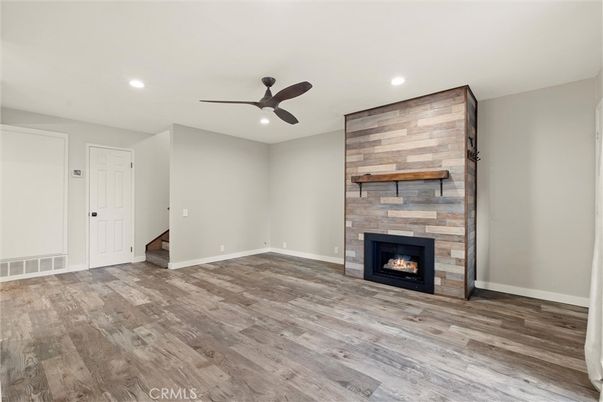 Empty room, Fireplace, Interior, Recessed Lighting, Wood Texture Flooring