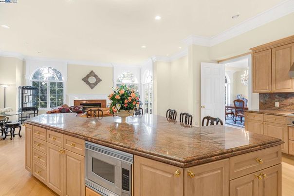 Dining room, Fireplace, Interior, Kitchen, Recessed Lighting, Wood Texture Flooring