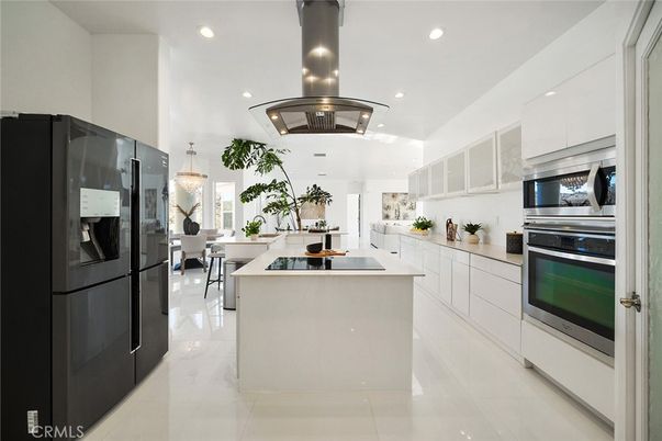 Chandelier, Dining room, Interior, Kitchen, Pendant Lights, Recessed Lighting, Stainless Steel Appliances