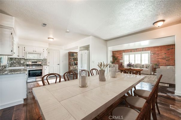 Dining room, Interior, Kitchen, Living room, Stainless Steel Appliances, Stone Walls, Wood Texture Flooring