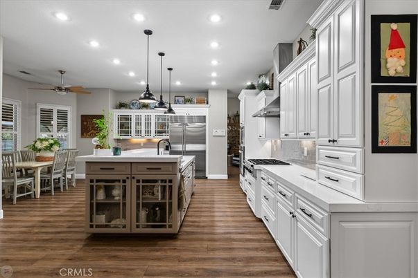 Dining room, Interior, Kitchen, Pendant Lights, Recessed Lighting, Stainless Steel Appliances, Wood Texture Flooring