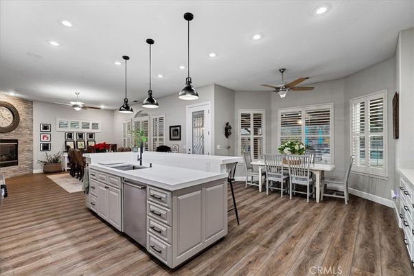 Dining room, Fireplace, Interior, Kitchen, Pendant Lights, Recessed Lighting, Stone Walls, Wood Texture Flooring