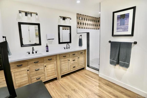 Bathroom, Dual Sink Vanities, Interior, Recessed Lighting, Wood Texture Flooring