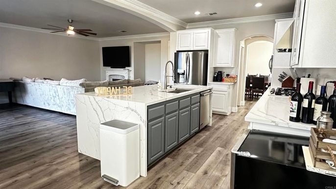Fireplace, Interior, Kitchen, Living room, Recessed Lighting, Wood Texture Flooring