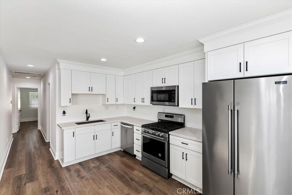 Interior, Kitchen, Recessed Lighting, Stainless Steel Appliances, Wood Texture Flooring