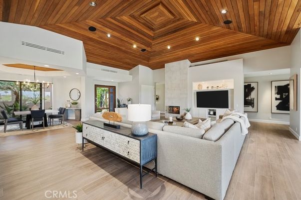 Dining room, Fireplace, Interior, Living room, Pendant Lights, Recessed Lighting, Wooden Ceilings, Wood Texture Flooring